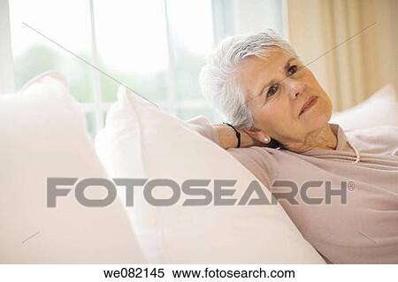 Stock Photography - at-home, concern, absorbed. Fotosearch