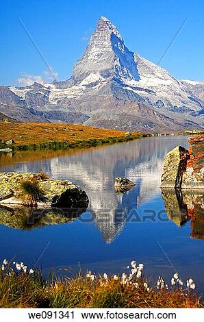 At lake Stellisee near Zermatt, Mt Matterhorn in the background, Zermatt, Valais Switzerland View Large Photo Image Stock Image - At lake Stellisee near Zermatt, Mt Matterhorn in the background, Zermatt, Valais Switzerland. Fotosearch