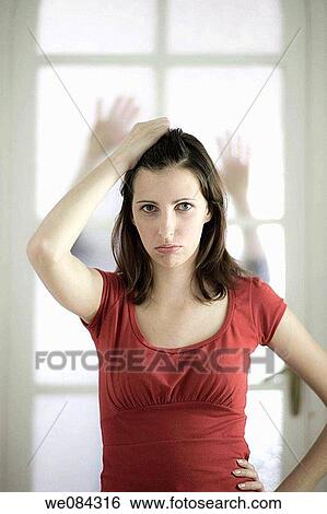 Stock Photograph - Attracting attention, catch, Bad mood, angry. Fotosearch