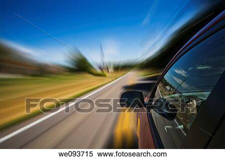Automobile driving down road with a blured affect View Large Photo Image Stock Photography - Automobile driving down road with a blured affect. Fotosearch