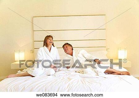 baby boomer, barefoot, bathrobe, bed, bedroom View Large Photo Image Picture - baby boomer, barefoot, bathrobe, bed, bedroom. Fotosearch