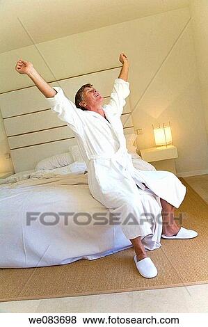 baby boomer, bed, bathrobe, Arms open View Large Photo Image Stock Photo - baby boomer, bed, bathrobe, Arms open. Fotosearch