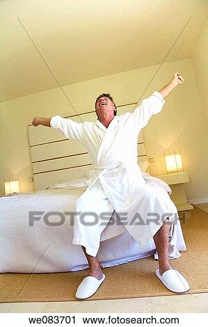 baby boomer, bed, bathrobe, Arms raised View Large Photo Image Stock Image - baby boomer, bed, bathrobe, Arms raised. Fotosearch