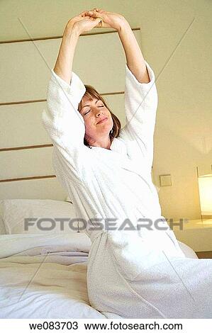 baby boomer, bedroom, bed, bathrobe, Arms raised View Large Photo Image Stock Image - baby boomer, bedroom, bed, bathrobe, Arms raised. Fotosearch