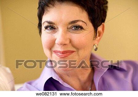 Stock Image - baby boomer, brunette, Close-up. Fotosearch