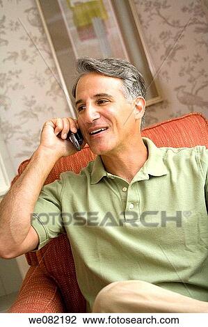 baby boomer, chair, cell phone, calling, at-home View Large Photo Image Stock Image - baby boomer, chair, cell phone, calling, at-home. Fotosearch