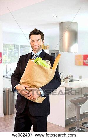 bag, businessman, business, black hair, at-home View Large Photo Image Stock Photo - bag, businessman, business, black hair, at-home. Fotosearch