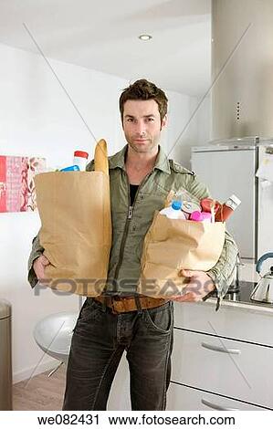 bag, carrying, carry, black hair, at-home View Large Photo Image Stock Image - bag, carrying, carry, black hair, at-home. Fotosearch