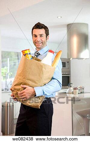bag, carrying, carry, black hair, at-home View Large Photo Image Stock Photo - bag, carrying, carry, black hair, at-home. Fotosearch