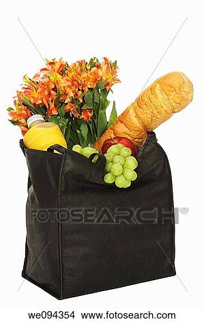 Picture - Bag of groceries isolated on a white background. Fotosearch