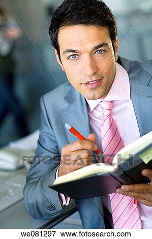 Ball-point pen, businessman, business, black hair, agenda View Large Photo Image Stock Photo - Ball-point pen, businessman, business, black hair, agenda. Fotosearch
