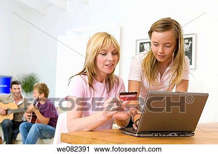 Bank card, boy, at-home View Large Photo Image Stock Image - Bank card, boy, at-home. Fotosearch