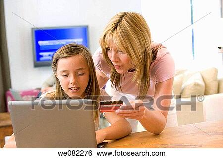 Bank card, child, at-home View Large Photo Image Stock Photograph - Bank card, child, at-home. Fotosearch