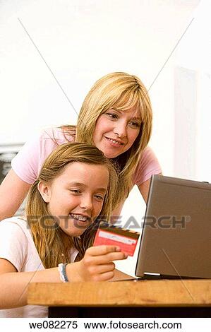 Bank card, child, at-home View Large Photo Image Stock Photography - Bank card, child, at-home. Fotosearch