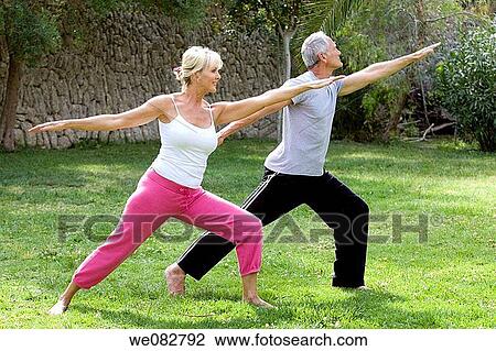 Stock Image - barefoot, contemporary, Arms open. Fotosearch