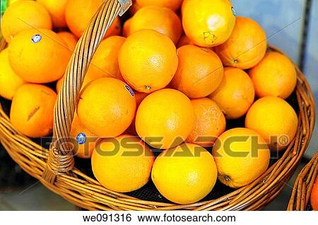 Basket of Navel Oranges Displayed in a Food Market View Large Photo Image Stock Photograph - Basket of Navel Oranges Displayed in a Food Market. Fotosearch