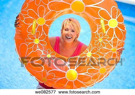 bathe, blond, bathing-suit, bathing, amusement View Large Photo Image Stock Photo - bathe, blond, bathing-suit, bathing, amusement. Fotosearch