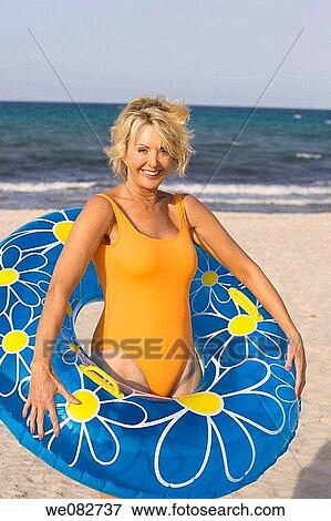 bathing-suit, blue, blond, beach, amusement View Large Photo Image Stock Photo - bathing-suit, blue, blond, beach, amusement. Fotosearch
