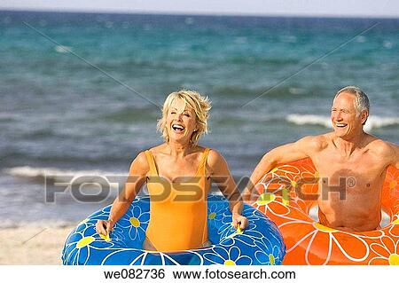 bathing-suit, carefree, beach, amusement View Large Photo Image Stock Photograph - bathing-suit, carefree, beach, amusement. Fotosearch