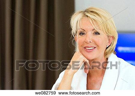 Stock Photo - bathrobe, blond, at-home. Fotosearch