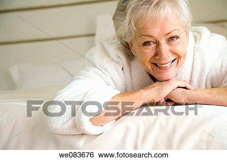 bathrobe, blue eyes, bedroom, bed, at-home View Large Photo Image Stock Photograph - bathrobe, blue eyes, bedroom, bed, at-home. Fotosearch