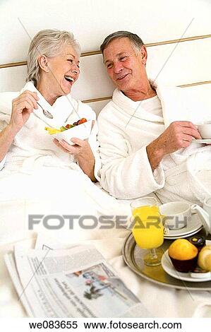 Stock Photography - bathrobe, bowl, bedroom, bed, at-home. Fotosearch