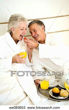 bathrobe, breakfast, bedroom, bed, at-home View Large Photo Image Stock Image - bathrobe, breakfast, bedroom, bed, at-home. Fotosearch