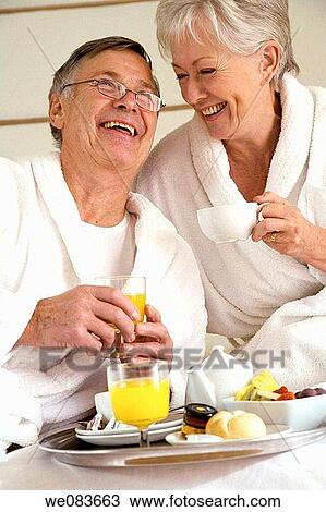 bathrobe, breakfast, bedroom, bed, at-home View Large Photo Image Stock Image - bathrobe, breakfast, bedroom, bed, at-home. Fotosearch