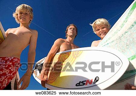 beach, blue, blue sky, board, boy View Large Photo Image Stock Photography - beach, blue, blue sky, board, boy. Fotosearch