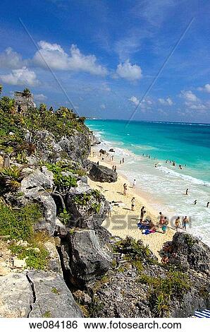 Beach by Mayan ruins of Tulum, Mayan Riviera. Quintana Roo, Yucatan Peninsula, Mexico View Large Photo Image Stock Photograph - Beach by Mayan ruins of Tulum, Mayan Riviera. Quintana Roo, Yucatan Peninsula, Mexico. Fotosearch