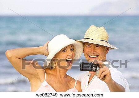 beach, camera, carefree View Large Photo Image Stock Photo - beach, camera, carefree. Fotosearch