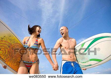 Stock Image - beach, carefree, board, amusement. Fotosearch