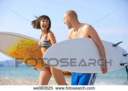 Stock Photography - beach, carry, board, amusement. Fotosearch
