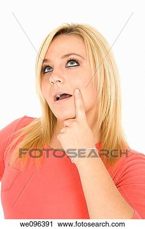 Beatiful Caucasian woman looking away as she is thinking View Large Photo Image Stock Image - Beatiful Caucasian woman looking away as she is thinking. Fotosearch