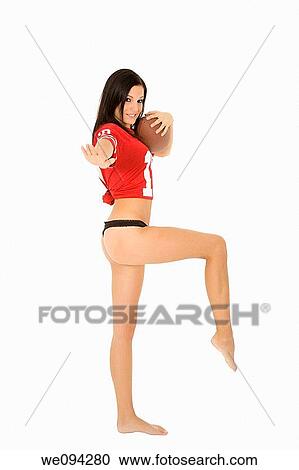 Beautiful and sexy Caucasian female posing with a football on white background View Large Photo Image Stock Image - Beautiful and sexy Caucasian female posing with a football on white background. Fotosearch