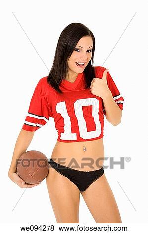 Beautiful and sexy Caucasian female posing with a football on white background View Large Photo Image Stock Photo - Beautiful and sexy Caucasian female posing with a football on white background. Fotosearch