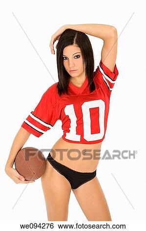 Beautiful and sexy Caucasian female posing with a football on white background View Large Photo Image Stock Photograph - Beautiful and sexy Caucasian female posing with a football on white background. Fotosearch