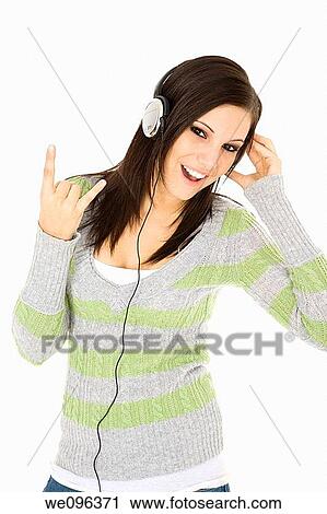 Beautiful and sexy caucasian girl listening to music View Large Photo Image Stock Image - Beautiful and sexy caucasian girl listening to music. Fotosearch