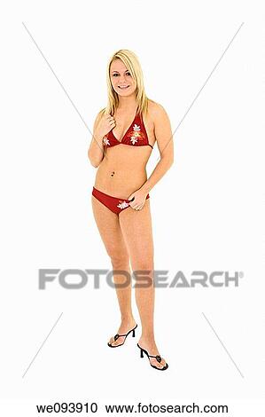 Beautiful and sexy caucasian woman in her early 20s posing in a red bikini on a white background View Large Photo Image Stock Image - Beautiful and sexy caucasian woman in her early 20s posing in a red bikini on a white background. Fotosearch