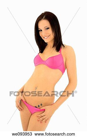 Beautiful and sexy caucasian woman in her early 20s posing in a pink bikini on a white background View Large Photo Image Stock Image - Beautiful and sexy caucasian woman in her early 20s posing in a pink bikini on a white background. Fotosearch