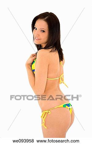 Beautiful and sexy caucasian woman in her early 20s posing in a Brazilian thong bikini on a white background View Large Photo Image Stock Photo - Beautiful and sexy caucasian woman in her early 20s posing in a Brazilian thong bikini on a white background. Fotosearch