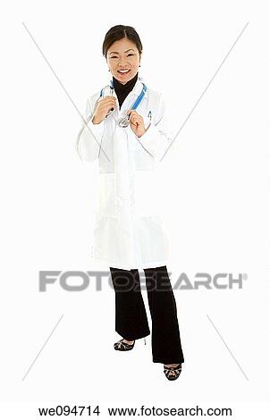 Beautiful Asian doctor or nurse on a white background View Large Photo Image Picture - Beautiful Asian doctor or nurse on a white background. Fotosearch