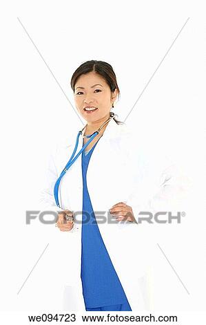 Beautiful Asian doctor or nurse on a white background View Large Photo Image Stock Image - Beautiful Asian doctor or nurse on a white background. Fotosearch