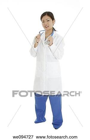 Beautiful Asian doctor or nurse on a white background View Large Photo Image Stock Photo - Beautiful Asian doctor or nurse on a white background. Fotosearch