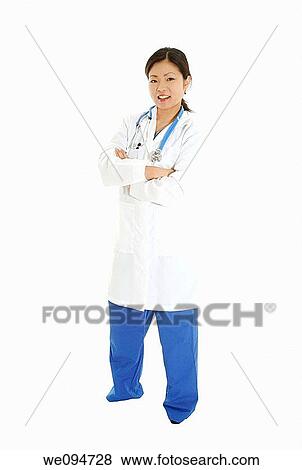 Beautiful Asian doctor or nurse on a white background View Large Photo Image Stock Photo - Beautiful Asian doctor or nurse on a white background. Fotosearch