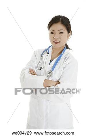 Beautiful Asian doctor or nurse on a white background View Large Photo Image Stock Photo - Beautiful Asian doctor or nurse on a white background. Fotosearch