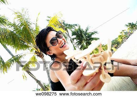 Beautiful asian woman looking at camera View Large Photo Image Stock Photography - Beautiful asian woman looking at camera. Fotosearch