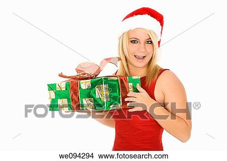 Beautiful Caucasain female holding gifts on white background View Large Photo Image Picture - Beautiful Caucasain female holding gifts on white background. Fotosearch