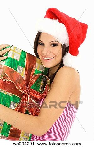 Beautiful Caucasain female holding gifts on white background View Large Photo Image Stock Image - Beautiful Caucasain female holding gifts on white background. Fotosearch