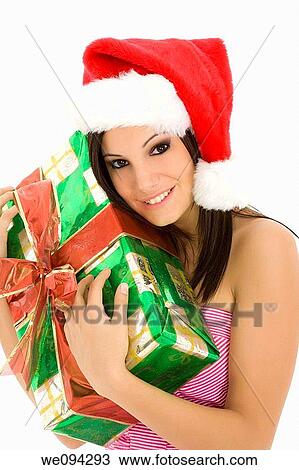 Beautiful Caucasain female holding gifts on white background View Large Photo Image Stock Image - Beautiful Caucasain female holding gifts on white background. Fotosearch